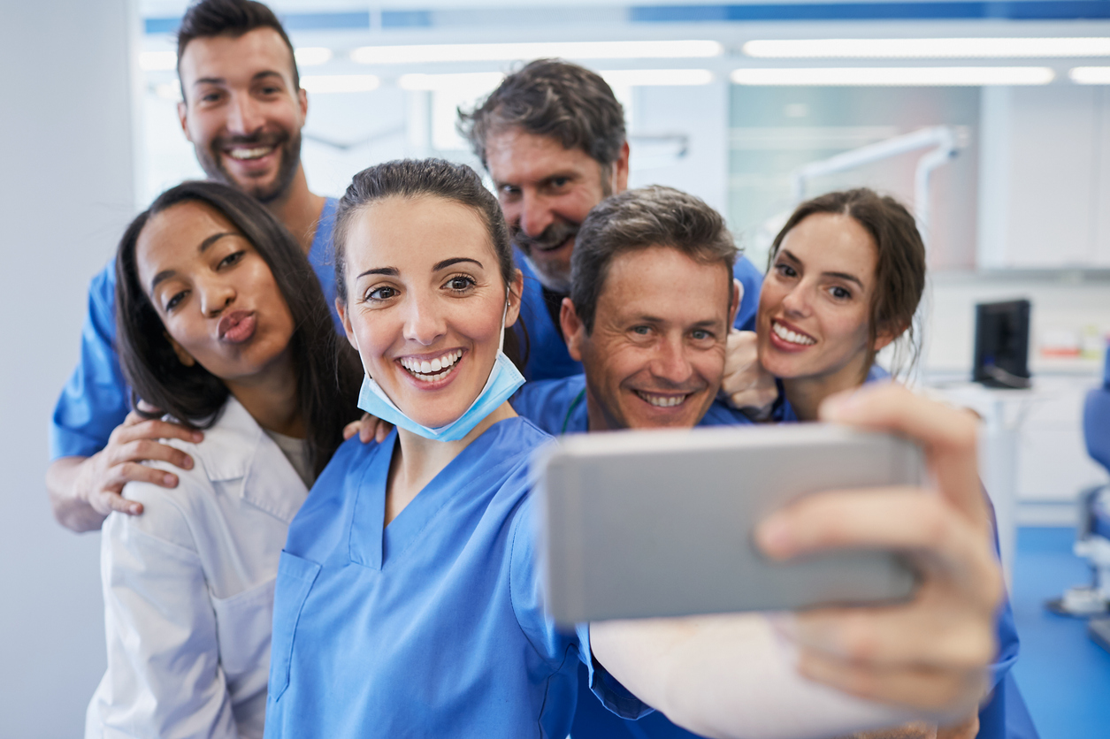 Healthcare workers selfie at work.